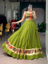 Olive Green Cotton Navratri Lehenga Choli with Zari Weaving & Cowrie Lace Blouse