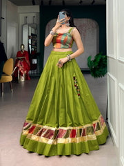 Olive Green Cotton Navratri Lehenga Choli with Zari Weaving & Cowrie Lace Blouse