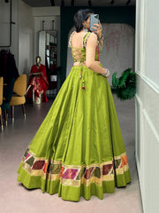 Olive Green Cotton Navratri Lehenga Choli with Zari Weaving & Cowrie Lace Blouse