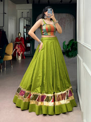 Olive Green Cotton Navratri Lehenga Choli with Zari Weaving & Cowrie Lace Blouse
